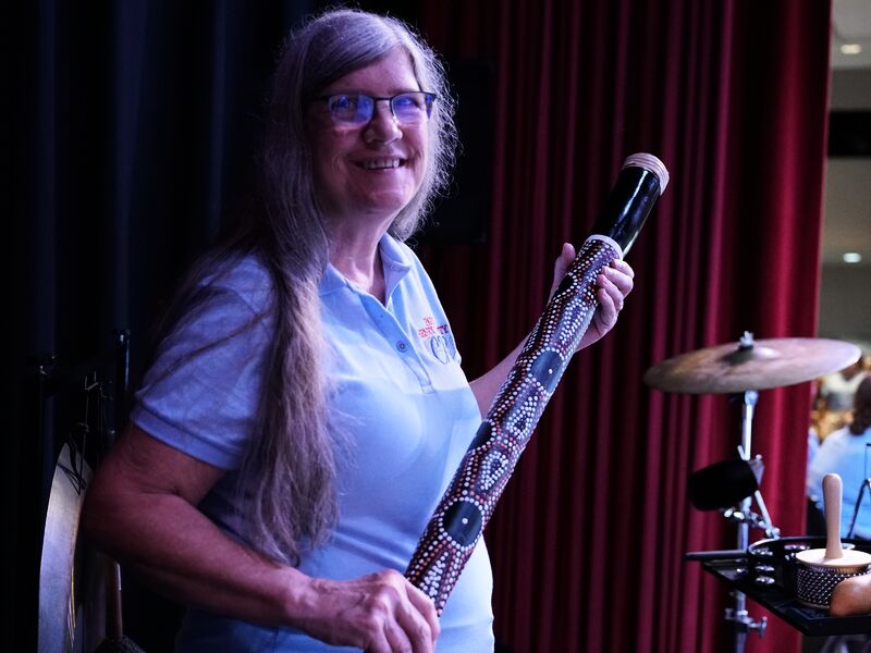 Volunteer Donna with band
